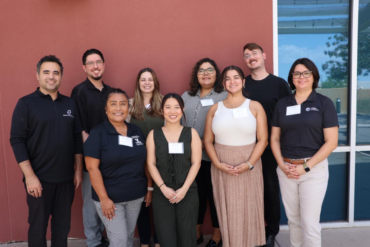 Members of the HIPMC Steering Committee smiling in a group photo at the September 2026 Quarterly Partner Meeting
