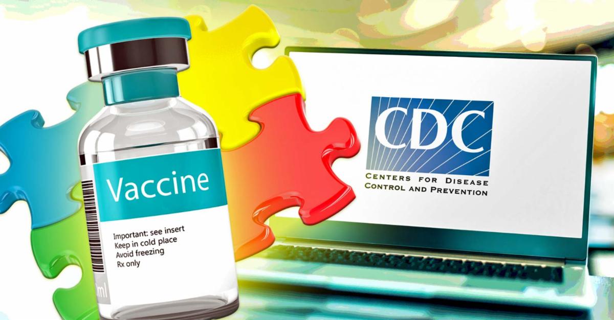 cdc on laptop and vaccine bottle