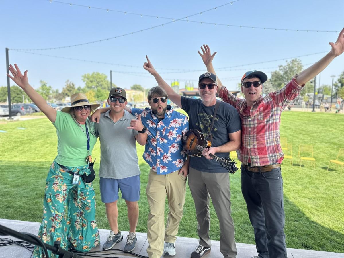  Group of performers on The Green at 38th stage with event coordinator.