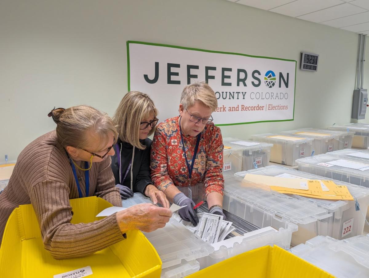 Three election workers at Jefferson County Elections.