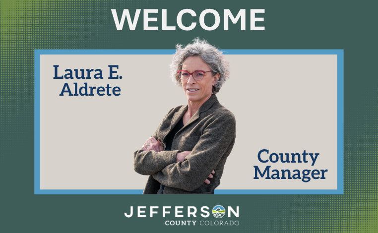 A graphic that says, "Welcome Laura E. Aldrete, County Manager" with a cutout profile photo and the Jefferson County logo.