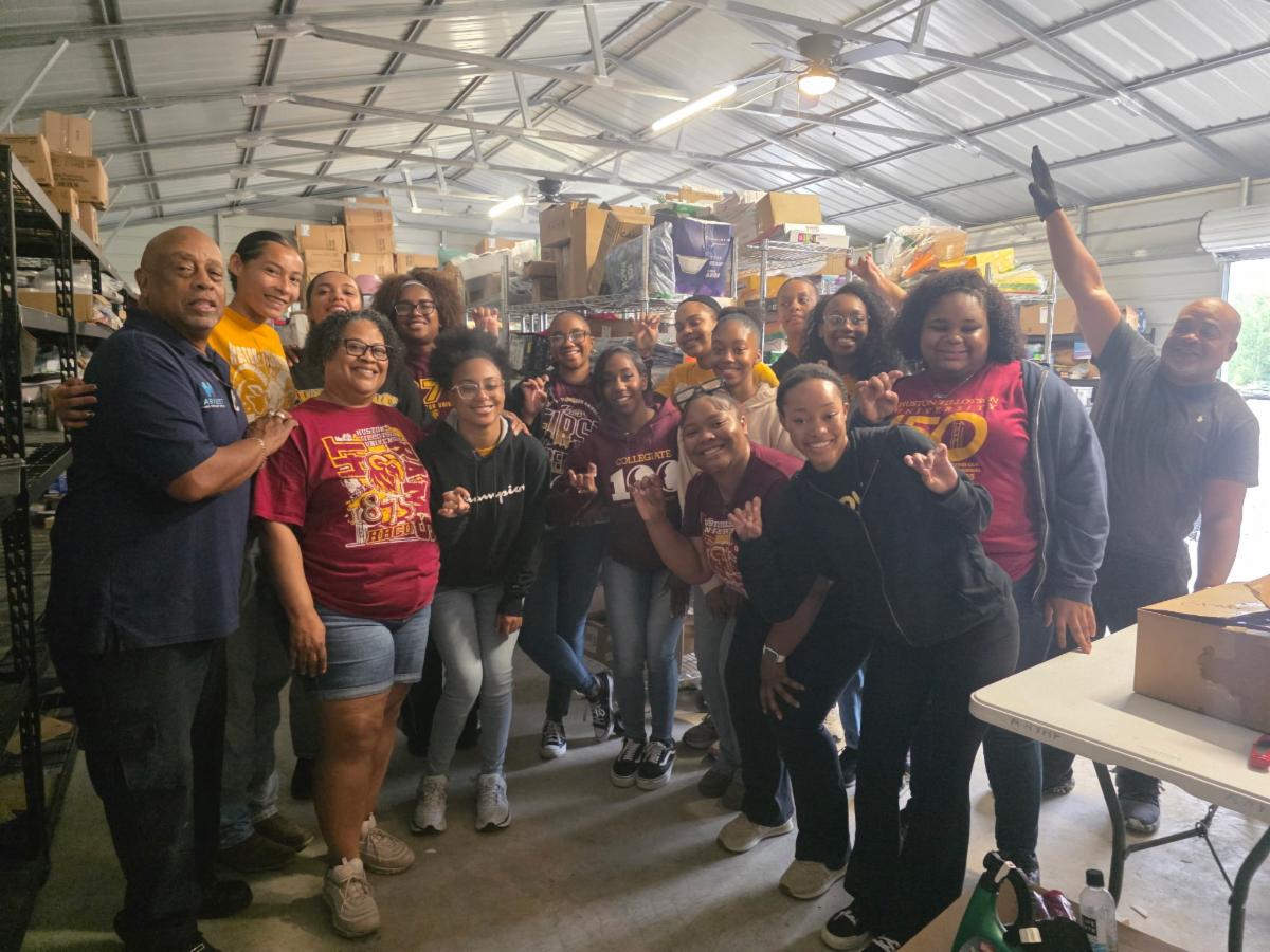 Huston-Tillotson University students volunteering with AAYHF