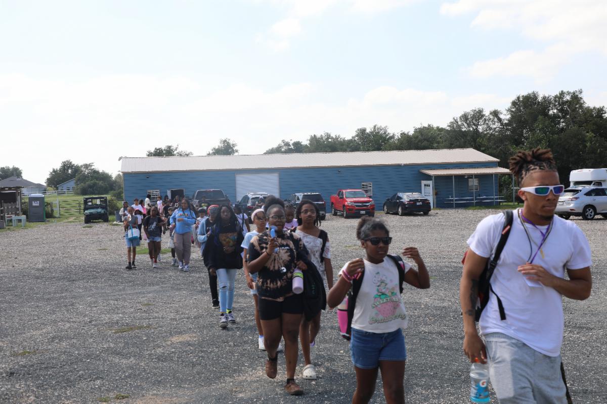 Urban University campers walking together during a field trip