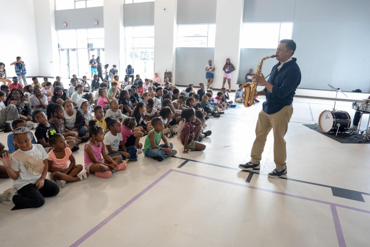 Urban University campers gathered for a music presentation