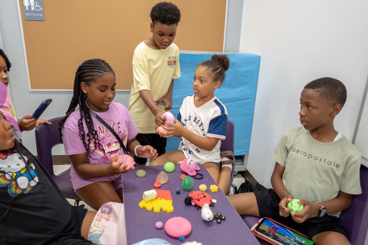 Urban University campers participating in a hands-on activity