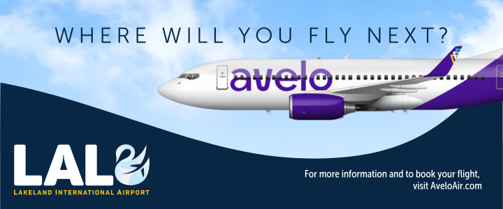 A graphic banner showing a 747 airplane with the Avelo Airlines logo flying through a clear blue sky. Bold text reads, 'Where will you fly next?' The banner invites viewers to check out flights from Lakeland International Airport with Avelo Airlines.
