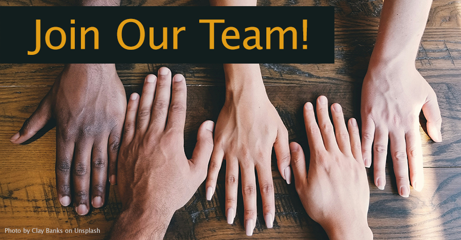 five hands palms down on a table with banner at top that says join our team