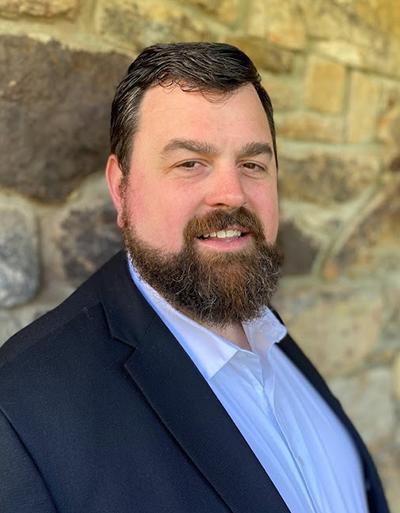 headshot of Zach Cummings