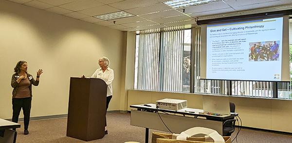 two women making a presentation