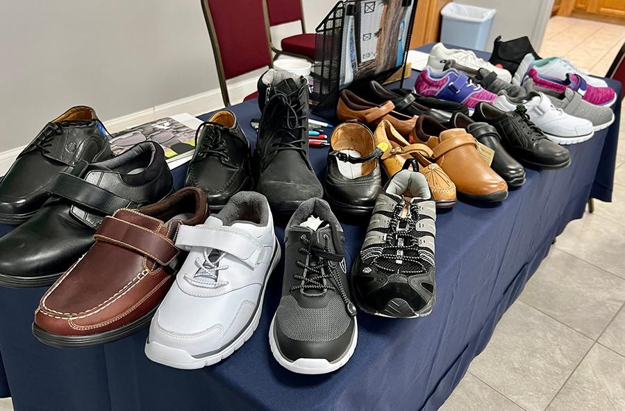 a variety of shoes on a table