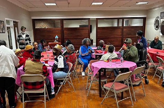 groups of people seated at tables