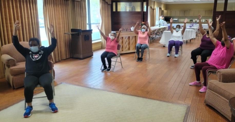 Participants in a chair exercise class