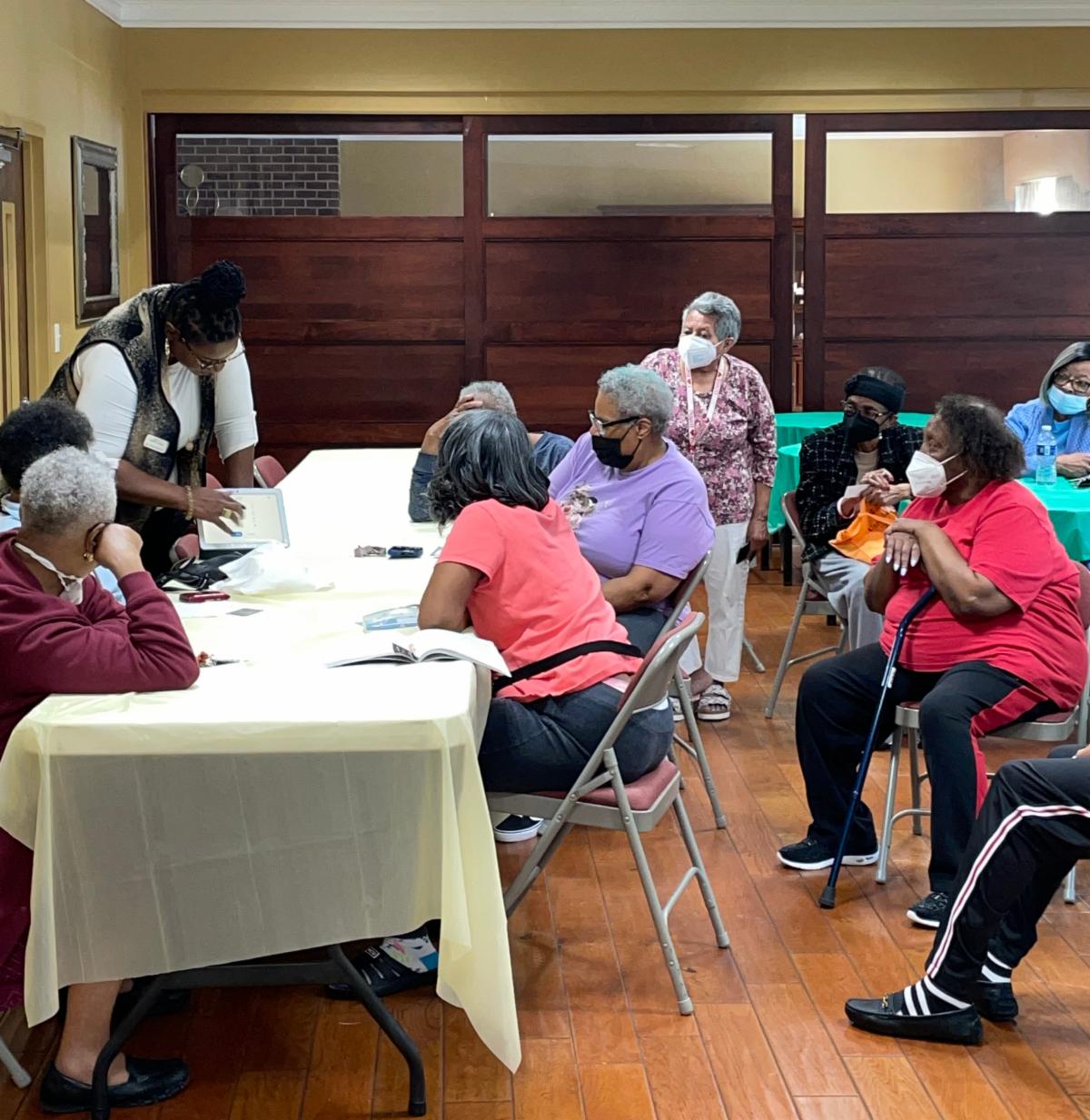 group of residents participate in a technology class