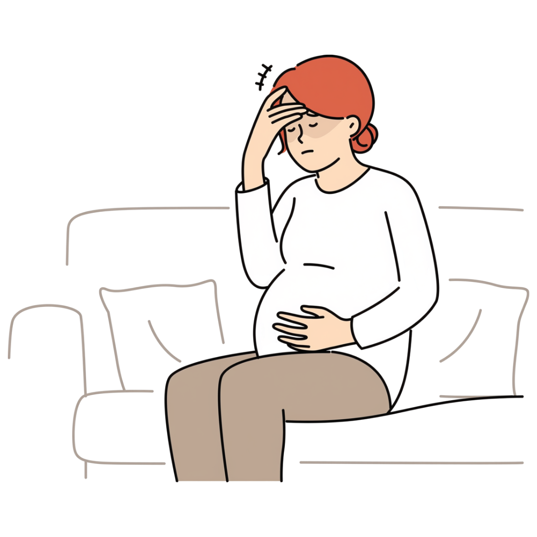 A pregnant woman with stomach and head pain sitting on a sofa.