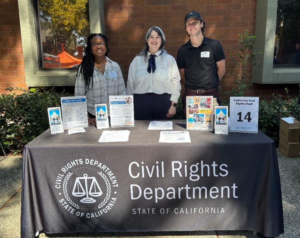 California Civil Rights Department staff share resources at a law school career fair.