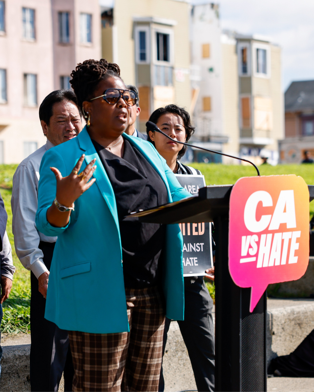 California Business Consumer Services and Housing Agency Secretary Tomiquia Moss gives a speech during the unveiling of the new Together We Rise mural in Oakland 