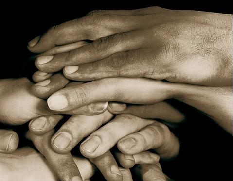 sepia_stacked_hands.jpg