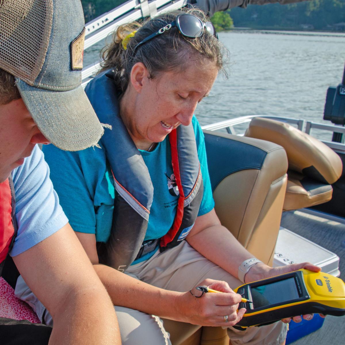 Ferrum College Professor of Environmental Science works with a student
