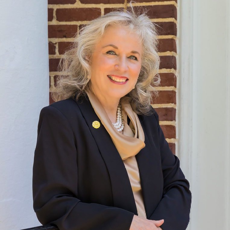 Headshot of President Mirta Martin
