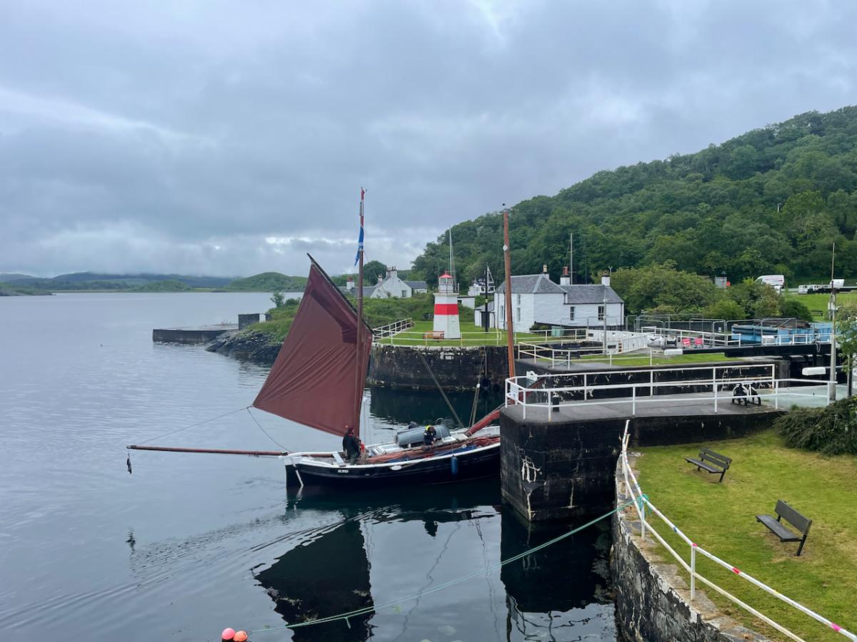 Boat going into Crinan Sea Lock