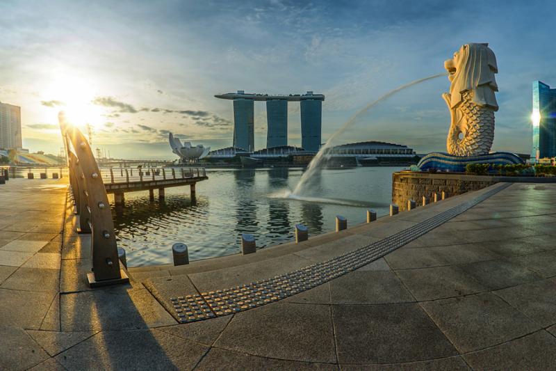 SINGAPORE - May 10  The Merlion fountain in front of the Marina Bay Sands hotel on May 10_ 2014 in Singapore. Merlion is a imaginary creature with the head of a lion_ seen as a symbol of Singapore