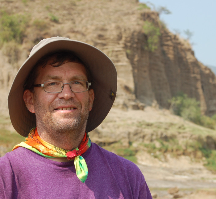 Headshot of Plummer outside