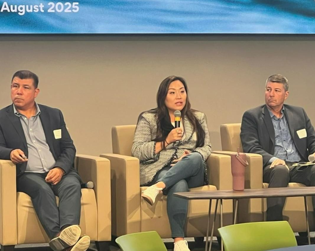 Panelists speaking at event