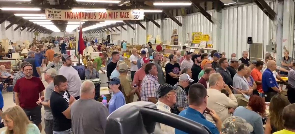 Large crowd of bidders at Burgess Auctions estate auction in Knightstown Indiana warehouse