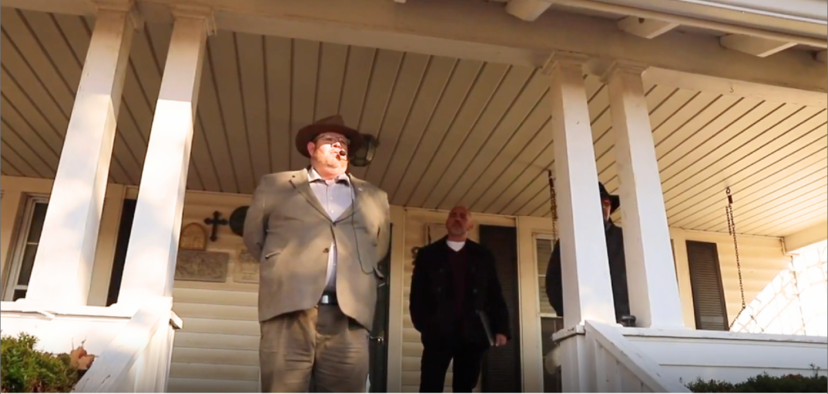 Zack Burgess conducting a real estate auction on-site with J. Snider Real Estate partner in Central Indiana