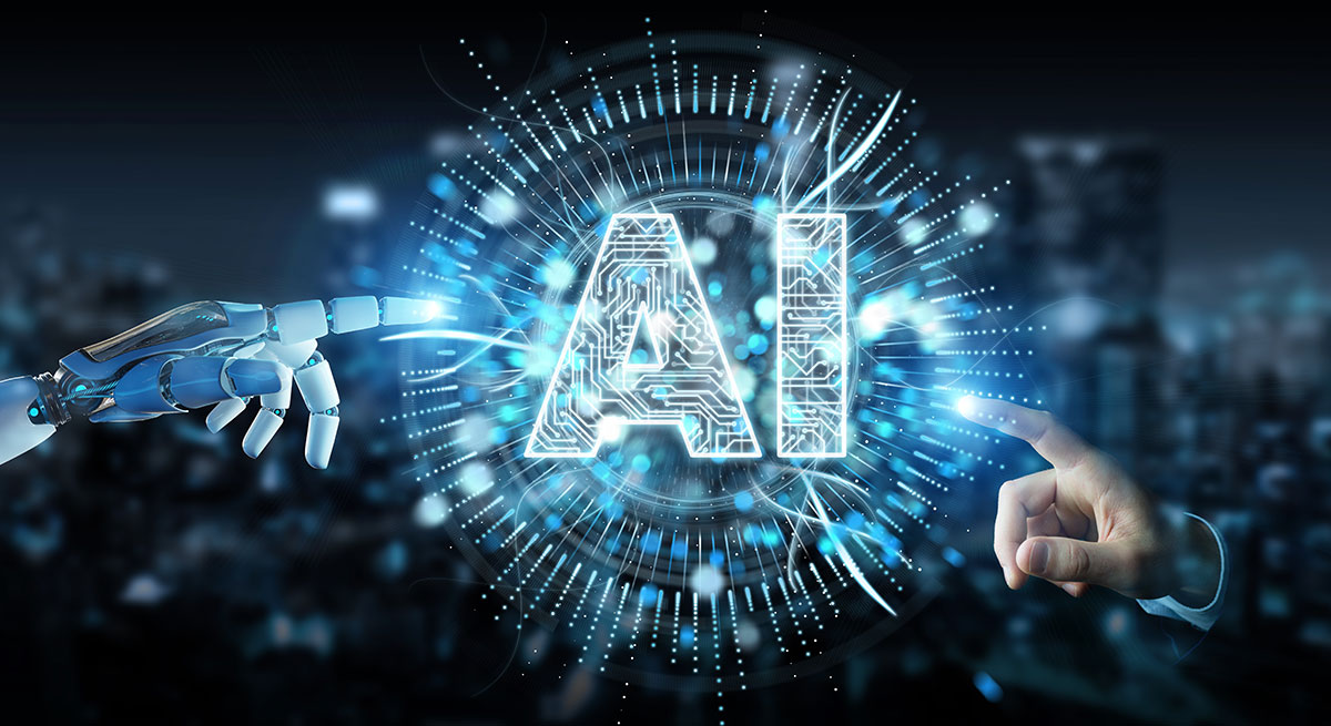 A robot hand and a human hand touching the letters AI