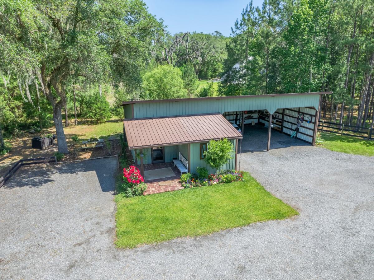 A must see! Stunning 15.37 Acre Equestrian Facility in Reddick, just a