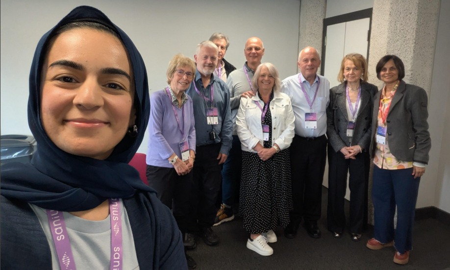 Hannah, IWMF's Global Partner Manager, poses with a group of WM patients and Shirley D'Sa in London