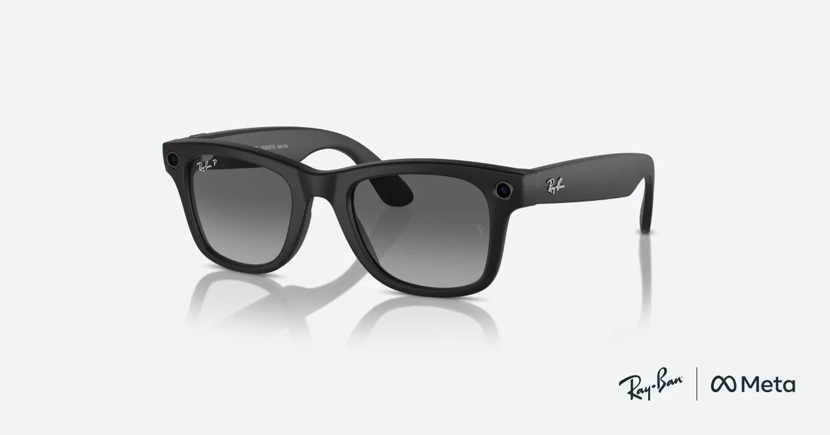 Product photograph showcases black Ray-Ban Meta smart glasses with dark lenses and integrated camera hardware. Ray-Ban and Meta logos appear at lower right.