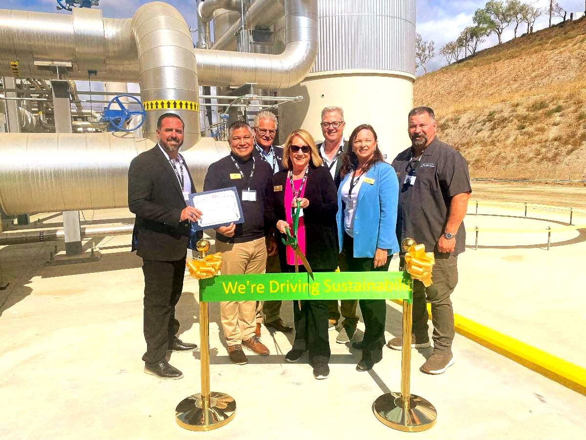 WM representatives along with Mayor Cavanaugh and City Council Members cut ribbon at opening of Renewal 