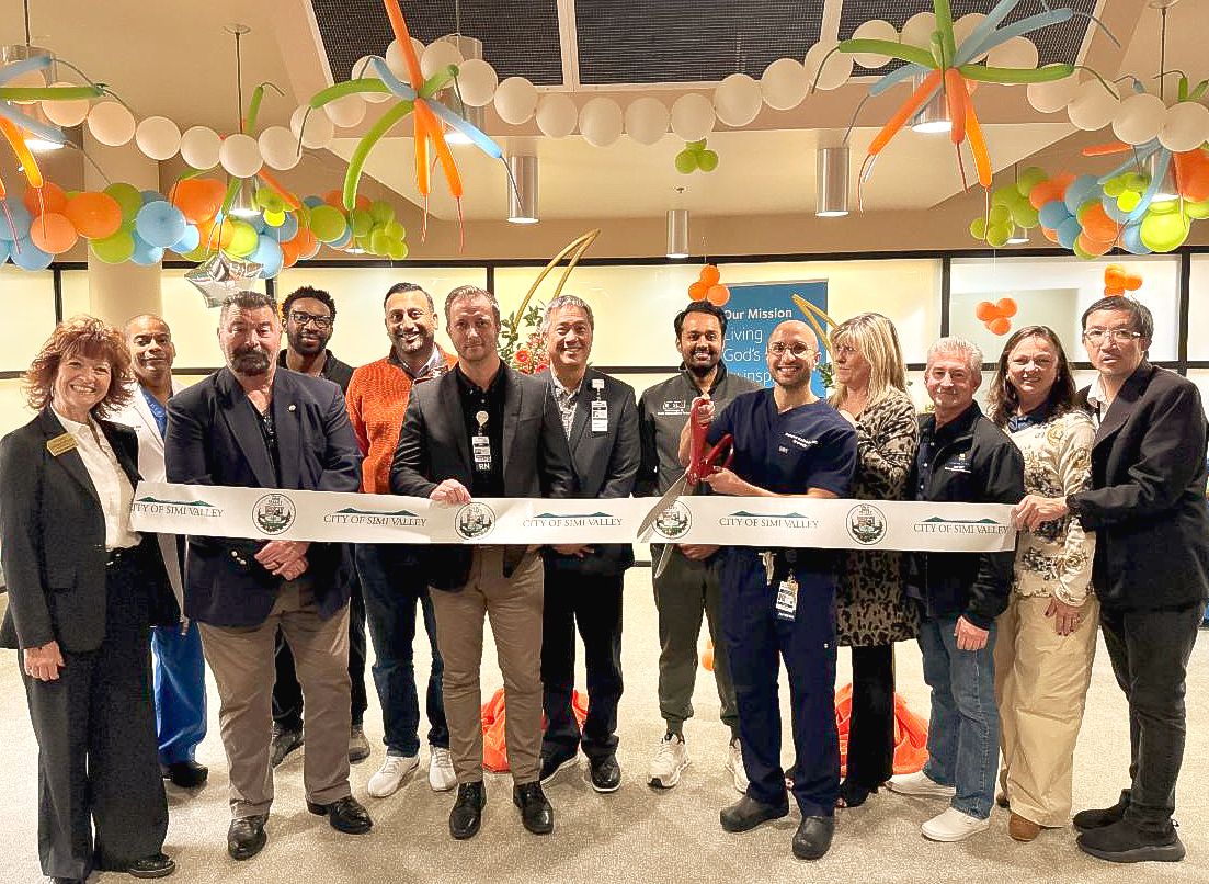 A small group of doctors and community leaders cutting ribbon for Adventist Health Simi Valley expanded Urology department