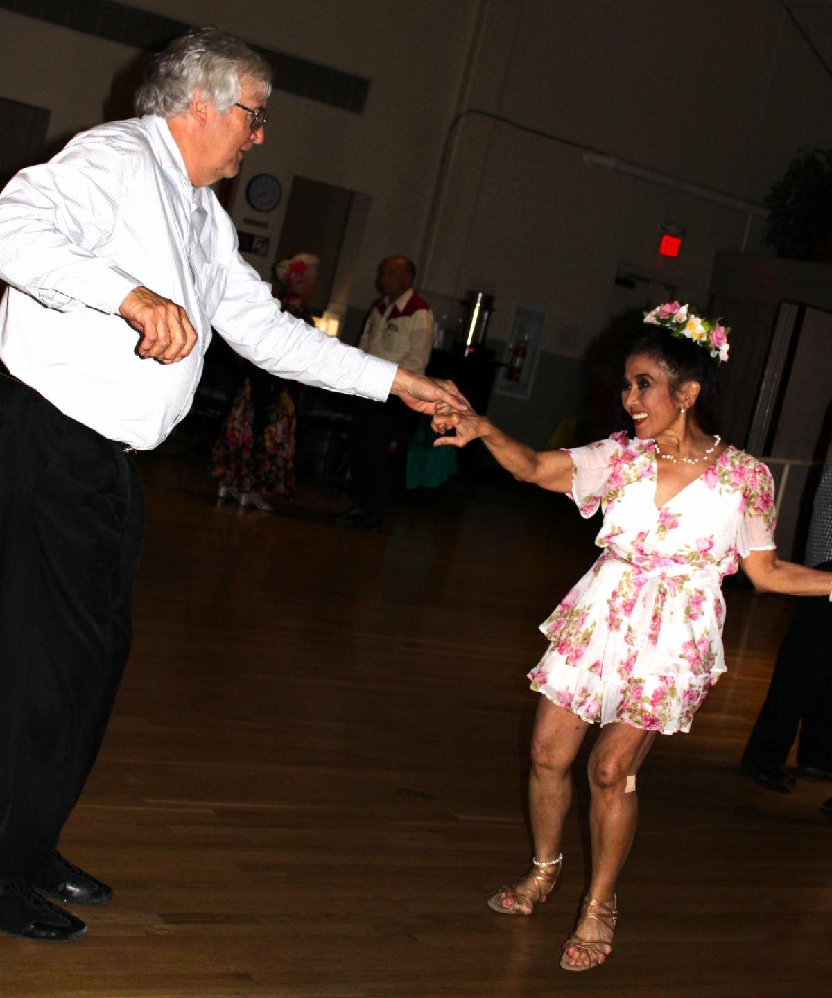 two seniors dancing at a senior center dance