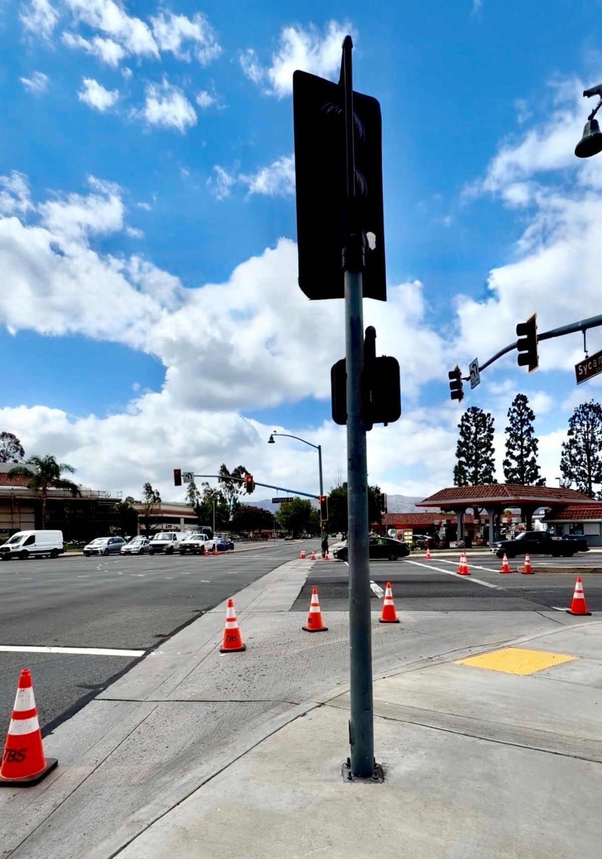 Traffic light with safety cones in street