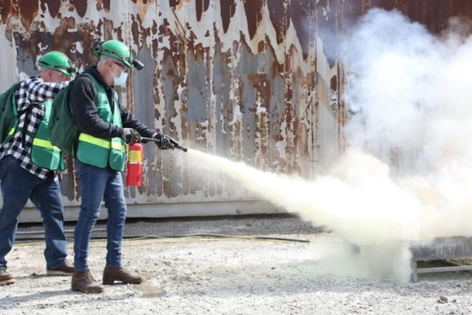 Community Emergency Response team volunteer training using a fire extinguisher