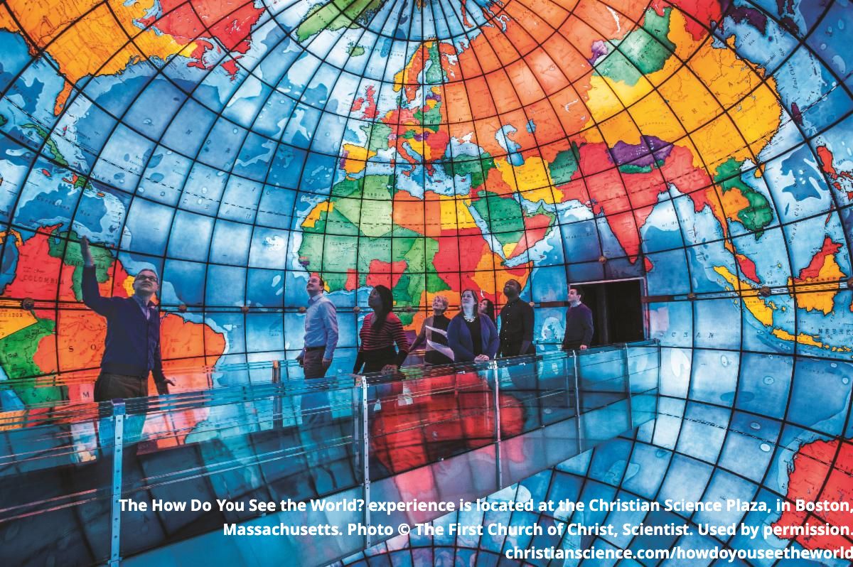 Visitors to The MappariumTM globe standing on a bridge in the center of the stained glass globe. The MappariumTM globe is located in the How Do You See the World?TM experience at the Christian Science Plaza, in Boston, Massachusetts, USA. Photo © The Christian Science Board of Directors. Used by permission.