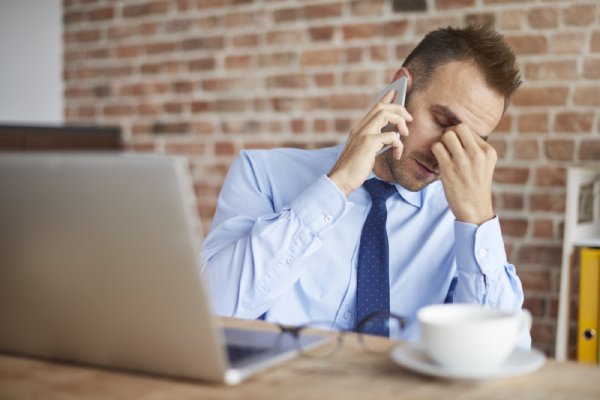 Stressed out Attorney in front of laptop