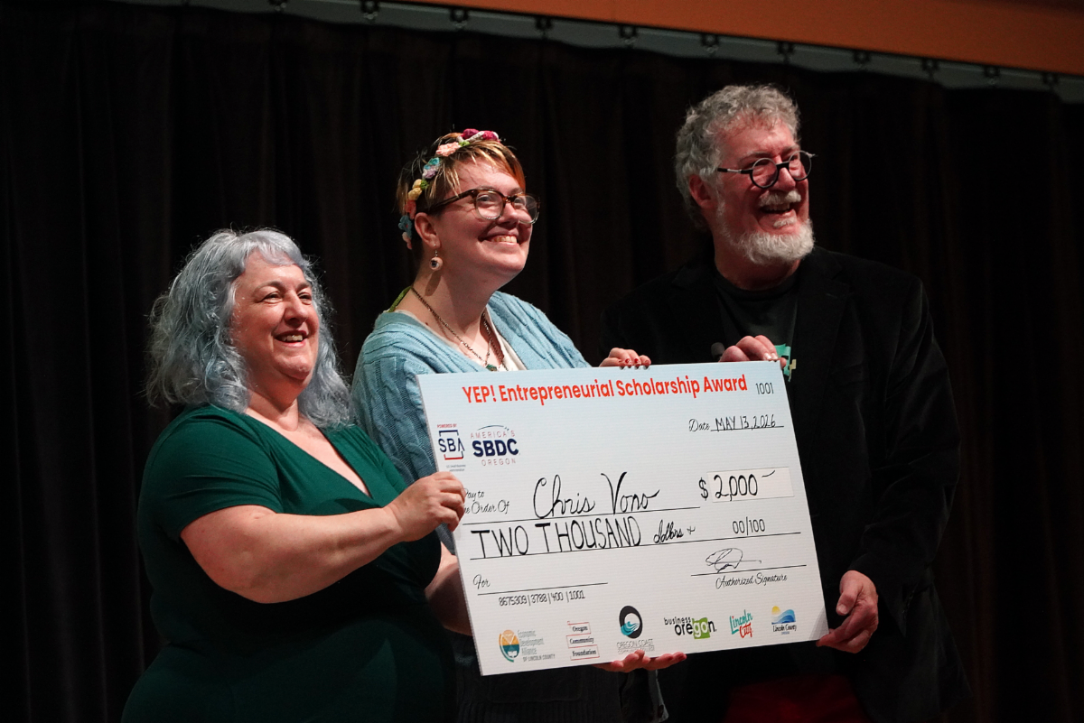 Presenting check to winner of the 3rd Annual “Youth Pitch” competition