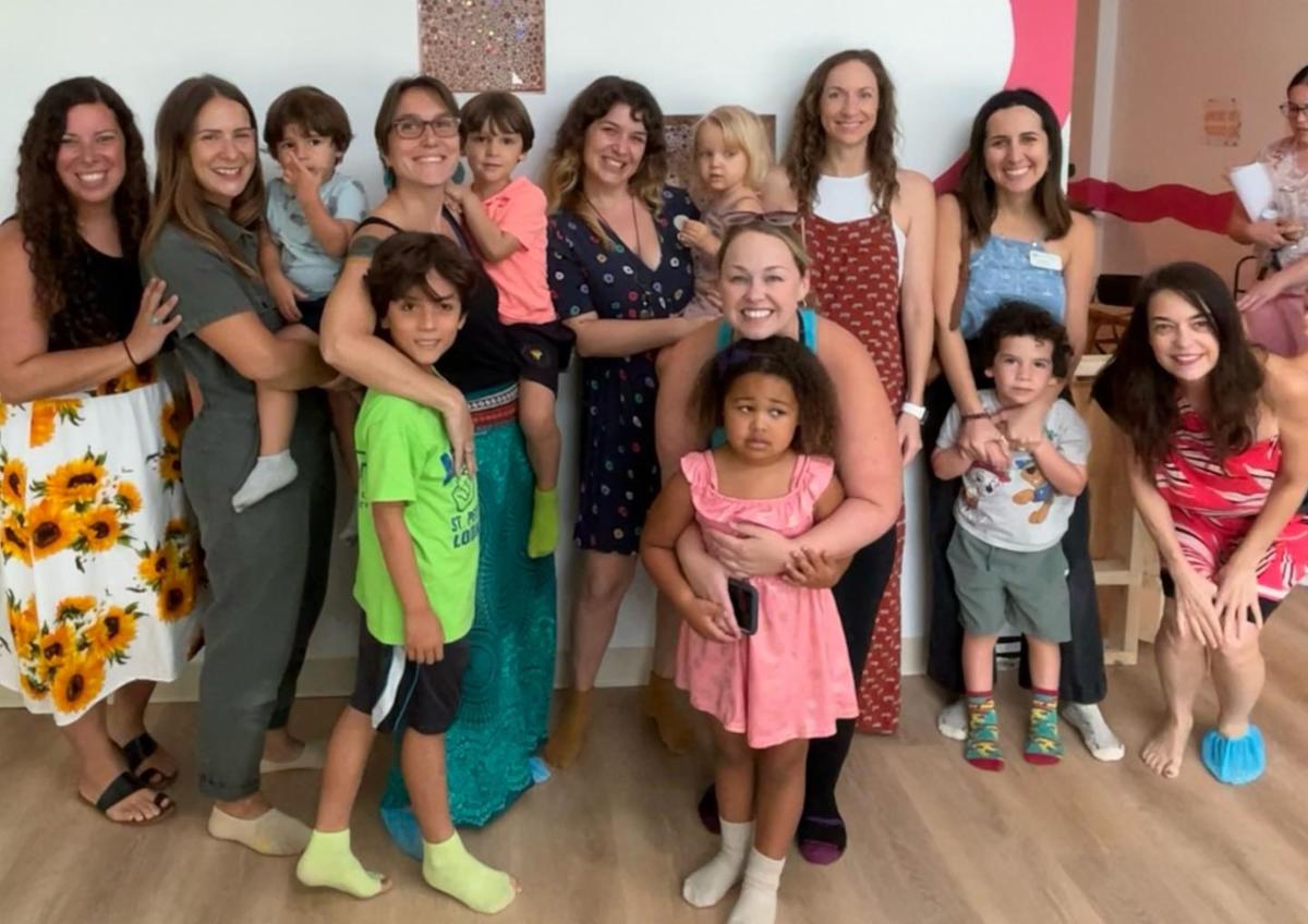 Group of parents with their children smiling together