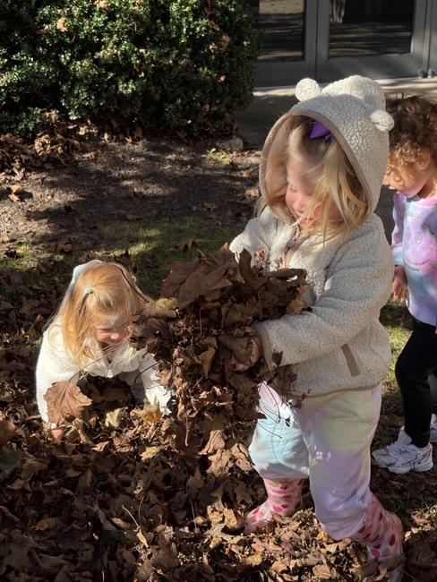Children in Prachim and Shorashim playing in autumn leaves