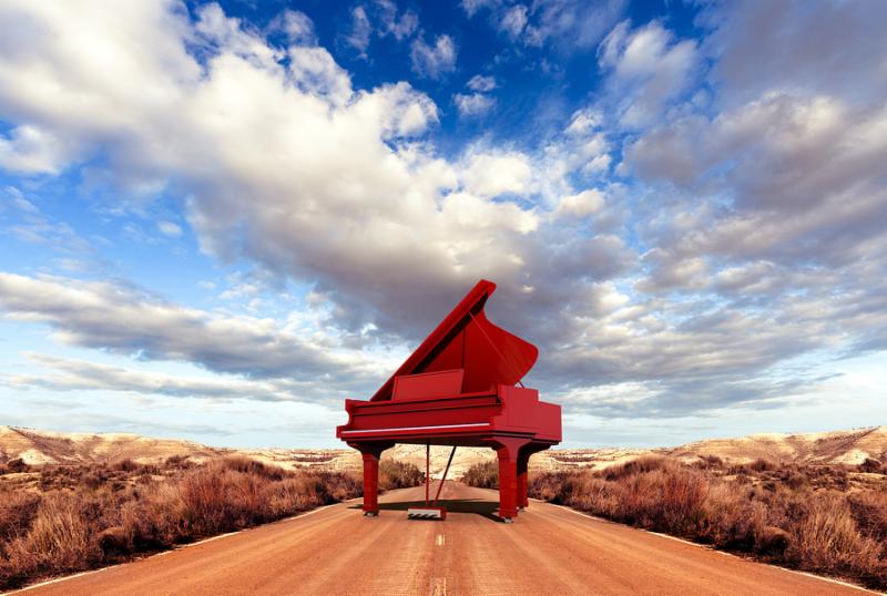 Music concept. Scenery and piano on the road