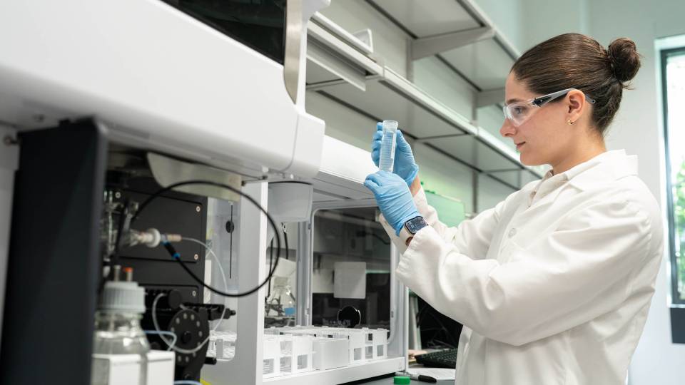 researcher working on lunar cement in a lab