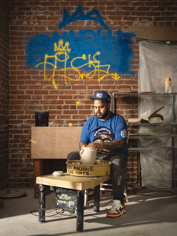 Robert Lugo at potting wheel