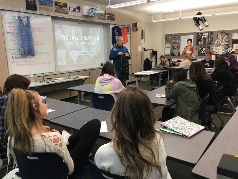 Students in Abby Durrett_s fashion design class listen to Dave Boland of Tommy Bahama talk about the company_s principles and methodology.