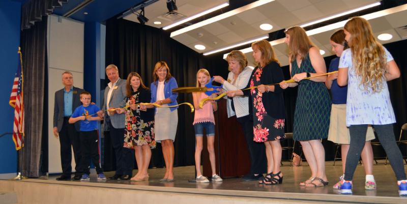 Ribbon cutting during dedication ceremony
