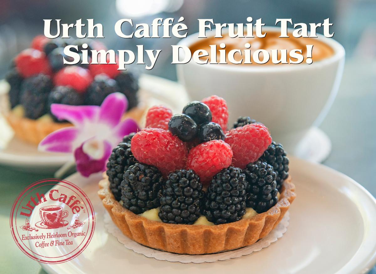 Photo of 2 Urth Caffé Fruit Tarts with a white ceramic cup of Urth Spanish Latté photo in the background.