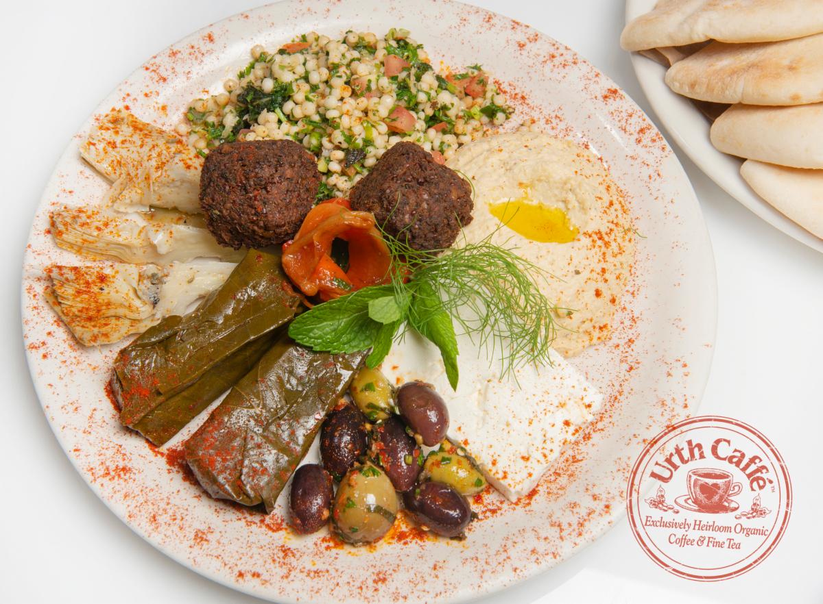 Photo of Urth Caffé Mediterranean Platter with garnish and Urth logo.